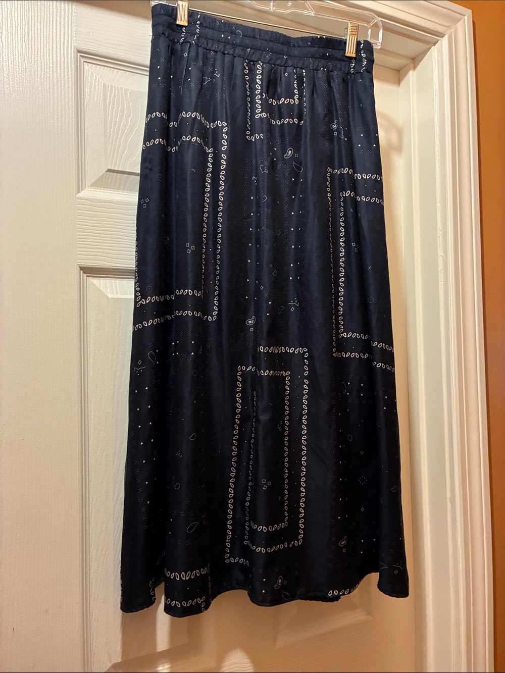 Harper Navy Blue Midi Skirt with bandana or paisley print pattern. It has lining